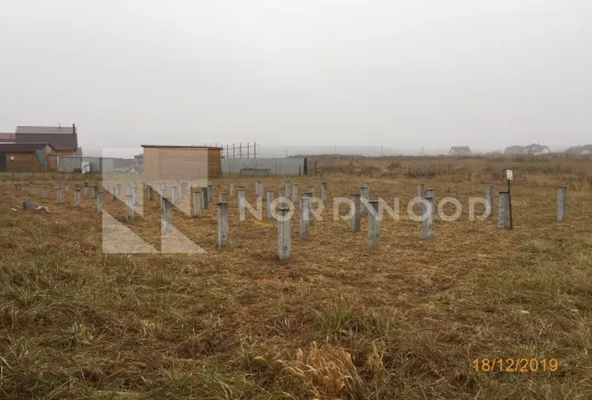 Устройство свайного Ж/Б фундамента под дом из клееного бруса  площадью 232,7 кв.м. фото 3  - NORDWOOD