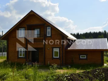 Отделка дома из оцилиндрованного бревна площадью  кв. м. фото 1 - NORDWOOD