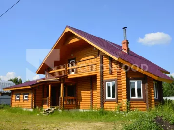 Отделка дома из оцилиндрованного бревна площадью  кв. м. фото 2 - NORDWOOD
