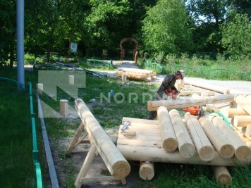 Сборка домика из оцилиндрованного бревна площадью фото 1 - NORDWOOD