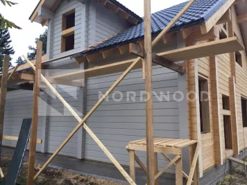 Покраска стен дома из клееного бруса площадью 152 кв. м. фото 1 - NORDWOOD