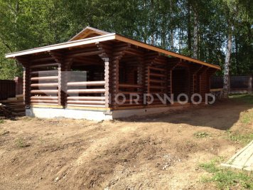 Покраска стен дома из оцилиндрованного бревна площадью  фото 1 - NORDWOOD