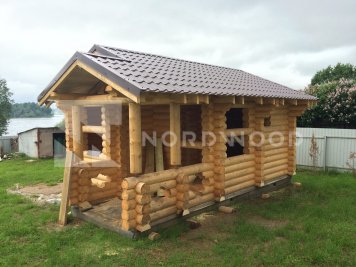 Сборка дома из оцилиндрованного бревна площадью 18 кв. м. фото 1 - NORDWOOD