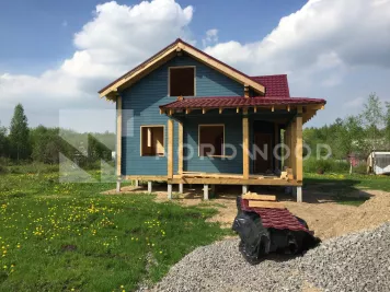 Покраска стен дома из профилированного бруса площадью 129 кв.м. фото 2 - NORDWOOD