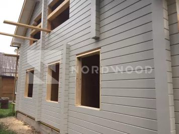 Покраска стен дома из клееного бруса площадью 152 кв. м. фото 7 - NORDWOOD